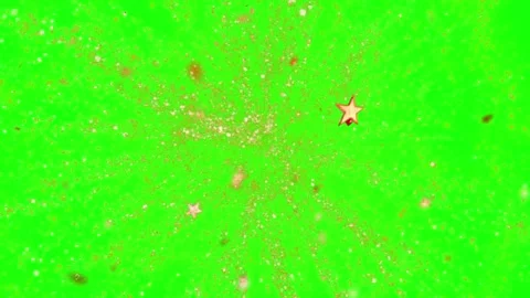 Vibrant star shaped particle explosions with glowing light flares on green Stock Footage 338388613