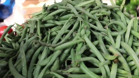 Vibrant string beans with curved natural shapes Stock Footage 338170098