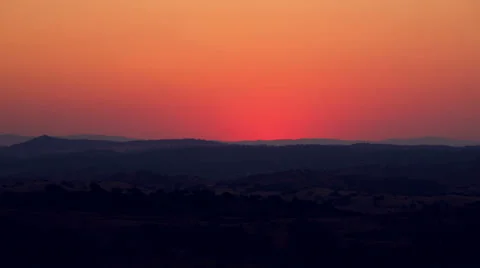 Vibrant Sunrise behind the Mountain Stock Footage 33577975