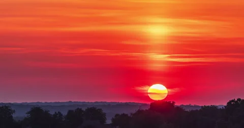 A vibrant sunrise over rural fields in Ukraine Stock Footage 293313448