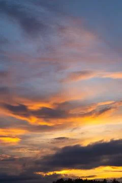 Vibrant Sunset Clouds in Evening Sky Stock Photos