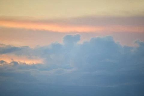 Vibrant Sunset Clouds over a Glowing Evening Sky Stock Photos