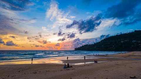 Vibrant Sunset Clouds Over Island at twilight Stock Photos