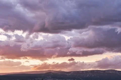 Vibrant Sunset with Dramatic Clouds Stock Photos