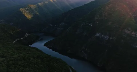 Vibrant Sunset Flares Rays Mountain Road River Rhodope Bulgaria Vucha Aerial Video stock 300489186