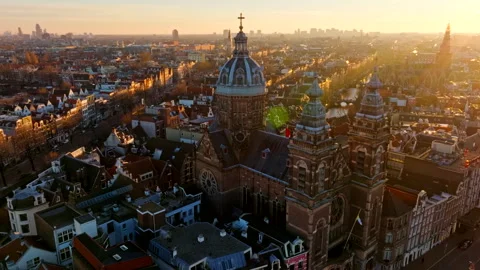 Vibrant Sunset Over Amsterdam Canals 4K Drone Cinematic Golden Light City Centre Video stock 334167424