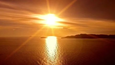 Vibrant Sunset Over Calm Ocean Waterscape Stock Footage 310324620
