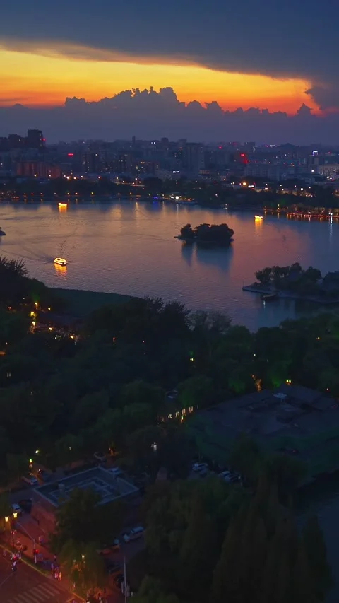 Vibrant Sunset Over Daming Lake, Jinan City Skyline at Twilight Stock Footage 331119336
