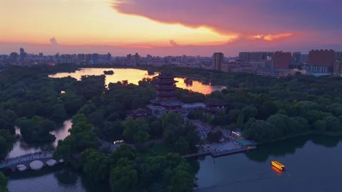 Vibrant Sunset over Daming Lake and Chaoran Tower in Jinan Stock Footage 331119969