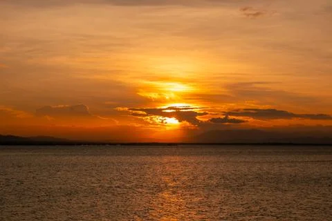 Vibrant Sunset Over the Ocean Stock Photos