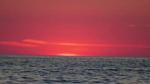 Vibrant sunset sky above ocean waves, dreamy romantic mood, colorful 4K slow Stock Footage 332302881