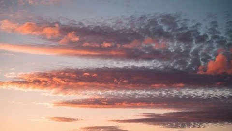 Vibrant sunset sky with colorful clouds during twilight Video stock 333648428