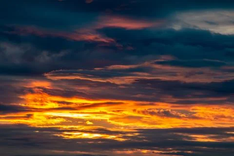 Vibrant Sunset Sky with Dramatic Cloudscape - Natures Palette Stock Photos