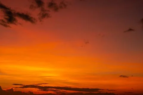 Vibrant Sunset Sky with Fiery Clouds Stock Photos