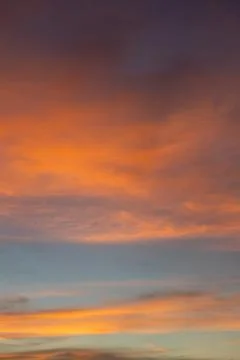 Vibrant Sunset Sky with Wispy Clouds Stock Photos