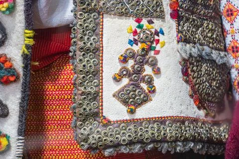 A vibrant textile artwork featuring geometric designs, reminiscent of tradi.. 스톡 사진