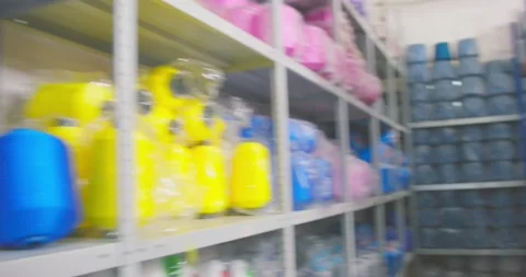 Vibrant textile display in fabric store aisle Stock Footage 293402057
