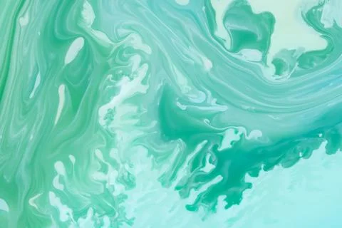 Vibrant turquoise and mint fluid paint create swirling marble patterns and or イラスト素材