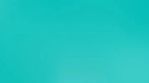 Vibrant turquoise grainy texture, seamless loop background. 4K video. Stock Footage 309700921