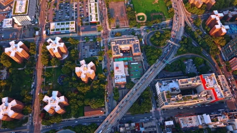 Vibrant urban grid pattern in New York City during golden hour. Flight over a Stock Footage 345936331