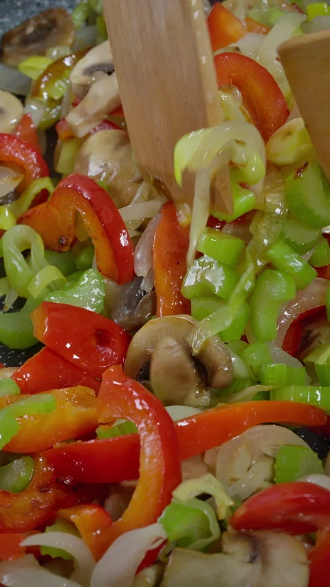Vibrant vegetable stirfry, Bright and tasty stirfried vegetables Stock Footage 329279059
