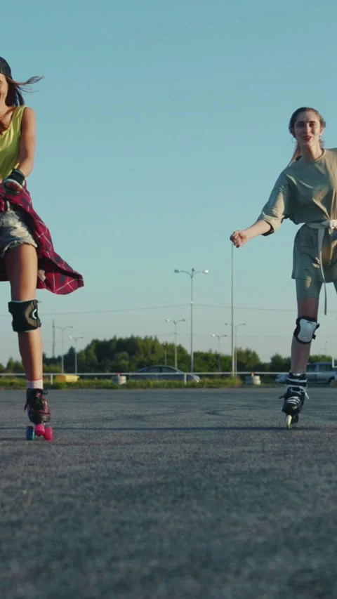 A vibrant video features rollerbladers showcasing skill and joy Stock Footage 316520470