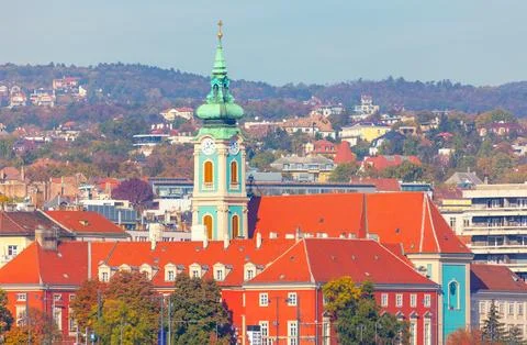 Vibrant view of Budapest featuring striking baroque church Stock Photos
