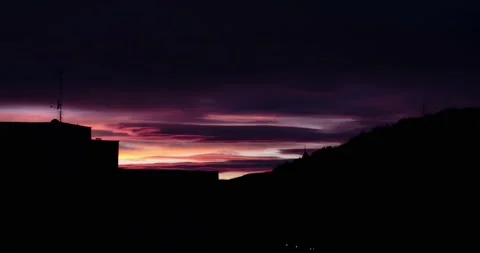 Vibrant violet pink sky during sunset in the city Stock Footage 193436795