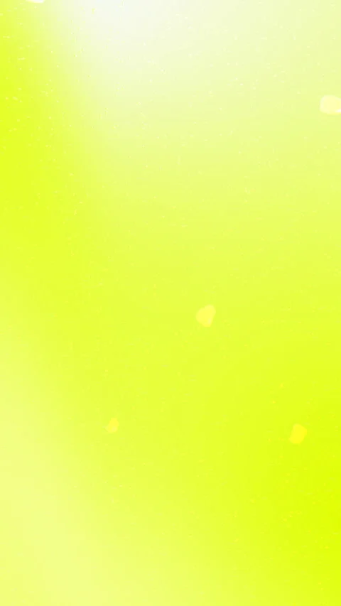 Vibrant Yellow Green Abstract Background with Floating Particles Stock-Footage 329254600