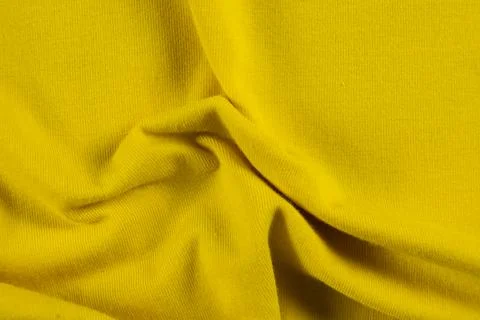 Vibrant Yellow Textile Pattern Close-Up. Foto stock