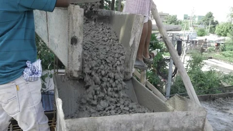 Vibrating Cement Mixer - Efficient Concrete Preparation Stock Footage 324025682