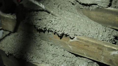 Vibrating fresh concrete during pouring and compaction process Video stock 323433491