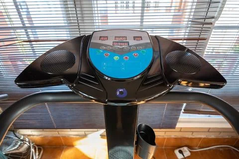 Vibrating gymnastics machine to exercise muscles and keep fit at home. Stock Photos