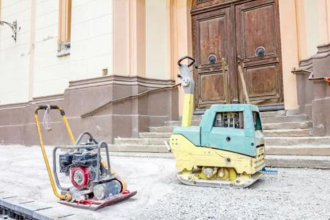 Vibrating machine for compacting soil Stock Photos