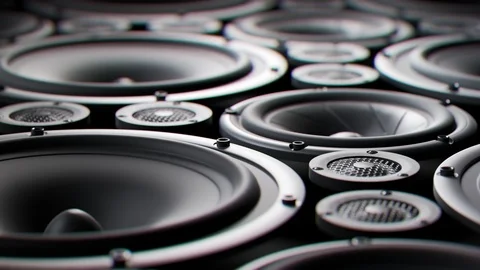 "Vibrating speaker membranes stacked in endless loop. Lit by studio lights. 4K Stock Footage 94590808