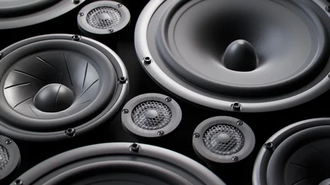 "Vibrating speaker membranes stacked in endless loop. Lit by studio lights. 4k Stock Footage 94591127