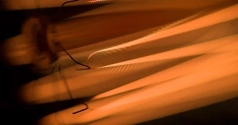 Vibrating Threads of Electric Lamp 4K Stock Footage 76239652
