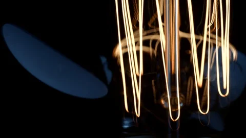 Vibrating Wiring Elements And Stem Of Burning Newton Lightbulb 스톡 동영상 104681681