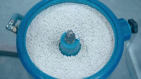 Vibration machining equipment performs the final grinding of metal parts Stock Footage 340630115