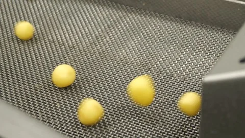 Vibration step of selecting vegetables. Washed and clean potatoes on blue 스톡 동영상 128204242