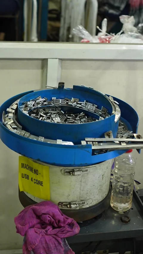Vibratory Bowl Feeder Sorting Electronic Components in Noida Unit Stock Footage 345810346