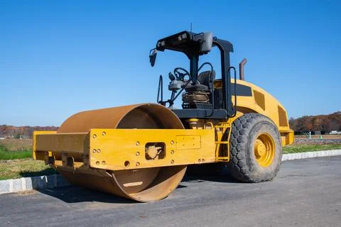 Vibratory compactor during road and highway construction industrial roadworks Stock Photos