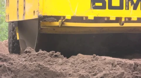 Vibratory roller, low angle, extreme close up Video stock 974009