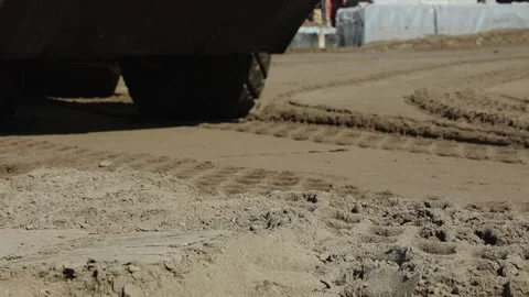 Vibratory roller on sand and moving Stock Footage 131180215