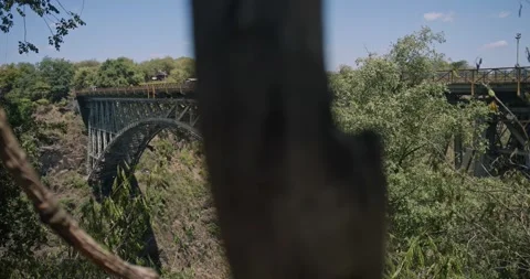 Vic Falls massive bridge and landmark between African country borders 動画素材 295058530