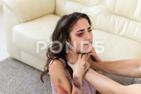 Victim, abuse and domestic violence - Woman being abused and strangled by strong Stock Photos