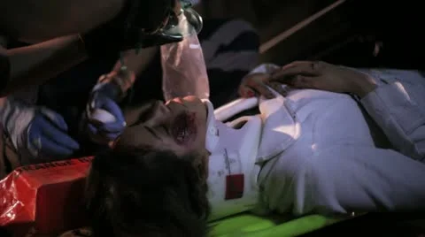 Victim of accident on stretcher Stock Footage 12658130