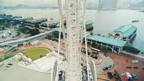 Victoria Bay seen from inside the panoramic Ferris wheel in Hong Kong Stock Footage 124996653