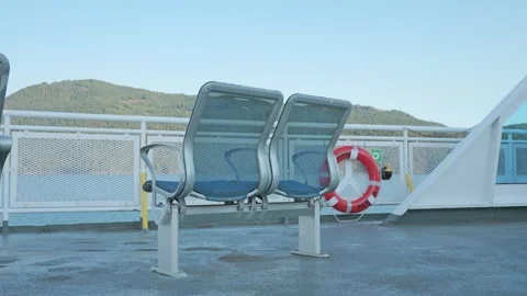 Victoria, BC, Canada - Aug 12, 2026: Passenger seats and lifebuoy ring on ferry Stock Footage 342052299