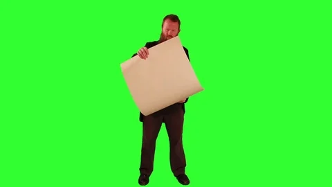 Victorian gentleman looks at a large scroll or plans (greenscreen) Stock Footage